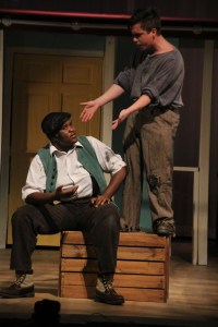 Jigger, played by senior Joe Schwalb tells Billy (William Toney) about stealing money.