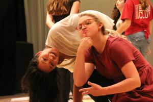 Emma Zander who plays the White Rabbit and Sarah Mai who is Alice gearing up for rehearsal