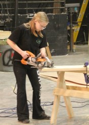 Sveta cutting out stairs for "The Mikado"