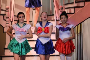 Maddie Fricker (Pitti-Sing), Maggie Collins (Yum-Yum) and Alexis Thompson (Peep-Bo) sing the famous song "Three Little Maids"