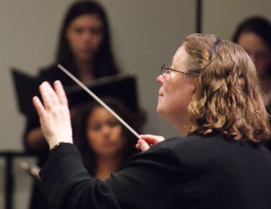 Ms. Winnie conducting Homestead Choirs
