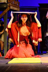 Alessandra playing a thief in a barrel!